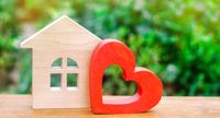 bigstock-House-With-A-Red-Wooden-Heart--259412026